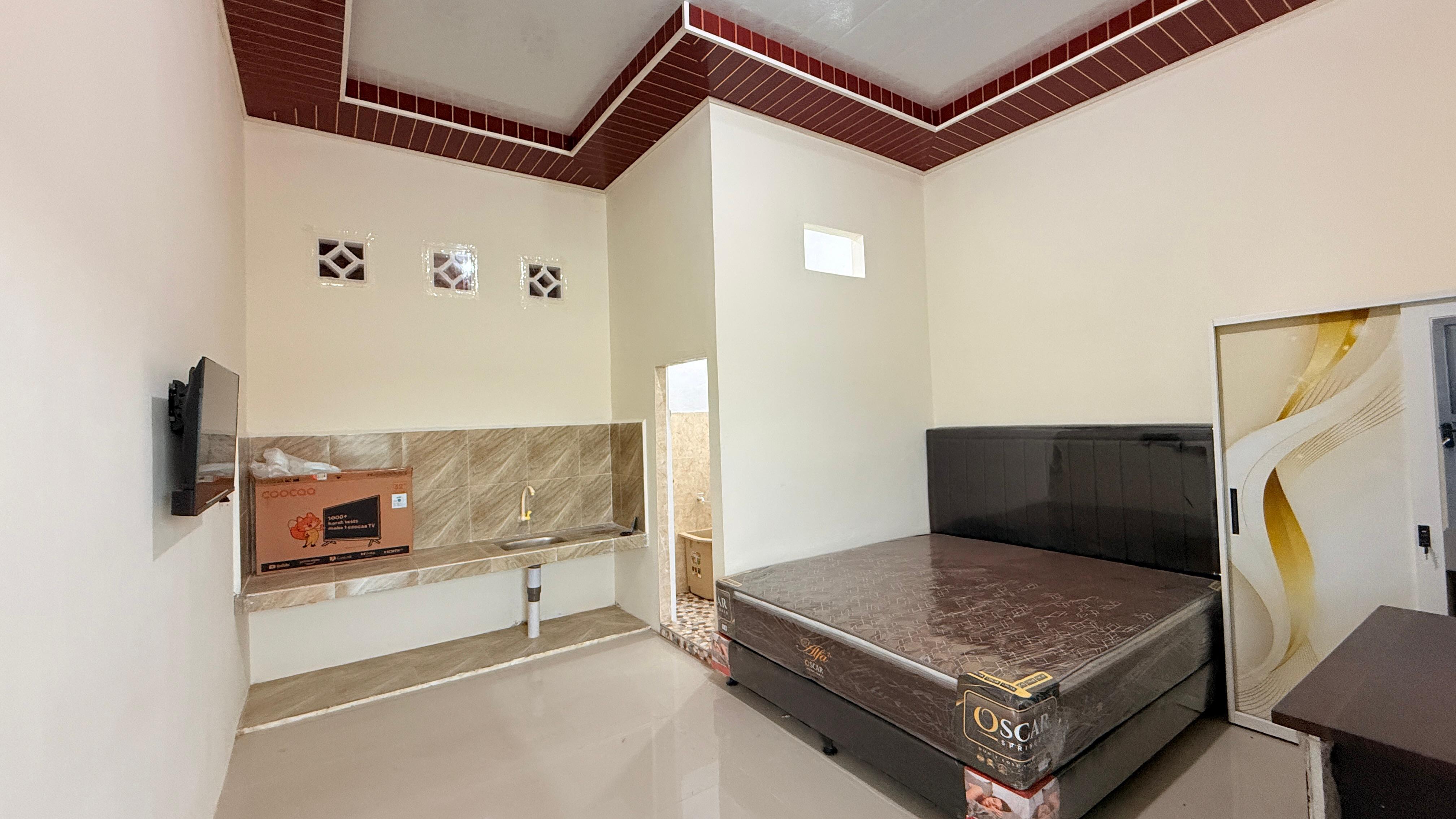 Kamar tidur Oppung Baho Palace